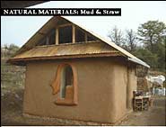 Paint and plaster studio, also called the rain chain building, almost finished. Straw bale walls with clay/straw plaster on exterior